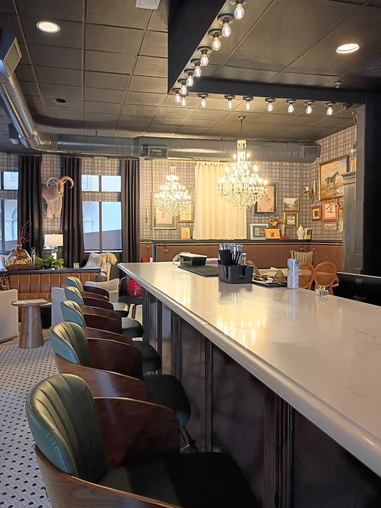 Bar counter and chandeliers at The Boardroom Lafayette